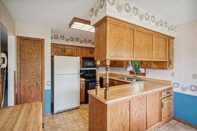 Kitchen with cabinet and pantry storage