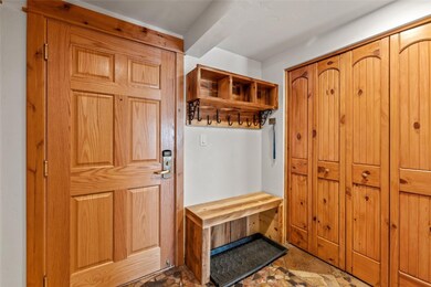 Mudroom with stone finish flooring