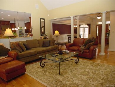 Great room is open to the kitchen, dining room and