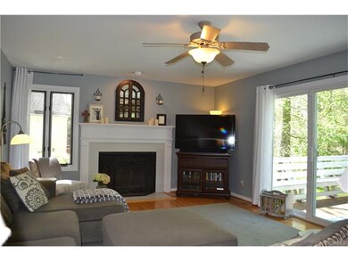Family room with hardwood floors, wood burning FP,