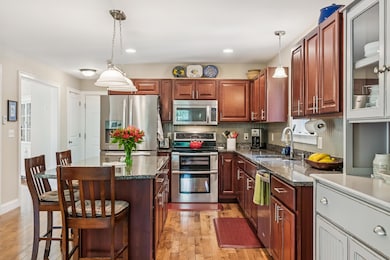Kitchen With Rich Cherry Cabinets