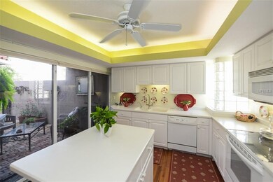 Neutral kitchen with loads of cabinets and natural