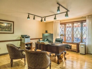Wood floors, broad window and adjoining Full Bath 