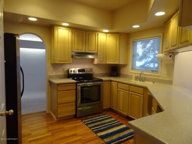 Kitchen with cherry flooring