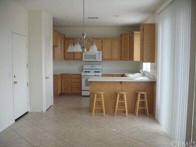 Dining area in kitchen with breakfast bar