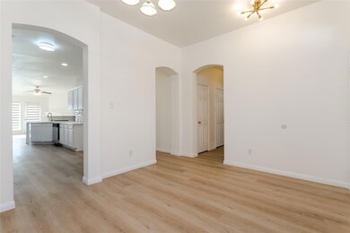 Unfurnished room featuring ceiling fan with notabl