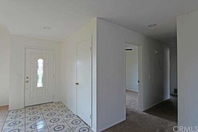 Glass accented front door entrance.