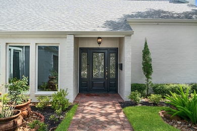 This gorgeous home has an inviting entrance that w