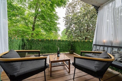Wooden deck with an outdoor living space