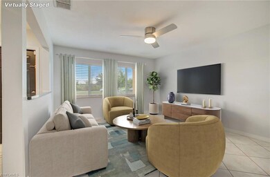 Large inviting living room off main entry.