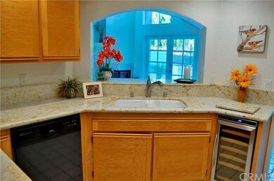 Bar open to family room with fireplace!