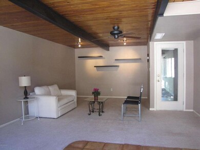 Formal Living Room with Wood Ceiling
