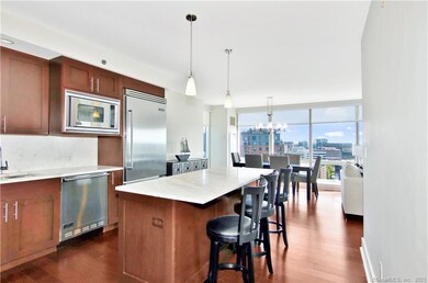 Abundant storage, top appliances, lg island, wine chiller & the views!