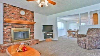 Gorgeous brick fireplace with hearth for added sea