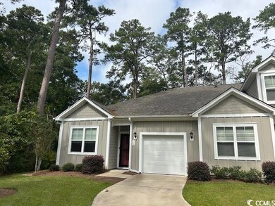 View of front of property featuring a front yard a