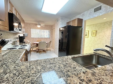 Fairway Club at Lucerne Pointe unit 314, Lake Worth, FL 33467 - photo 4