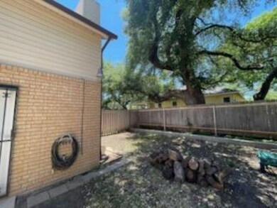 View of fenced backyard