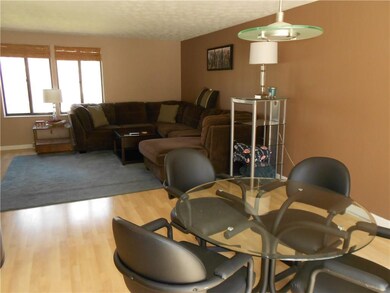 Formal dining room is adjacent to the living room,