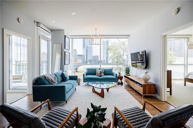 Living area featuring a wealth of natural light, a