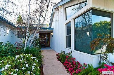 Front entry with room addition off front of home