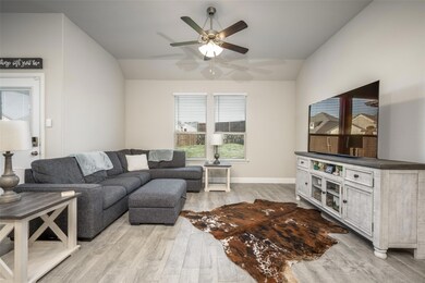 Living area featuring light wood-type flooring, lo