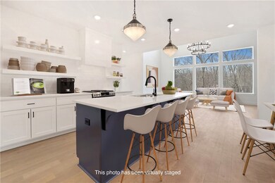 This is the actual home with digitally staged furniture.