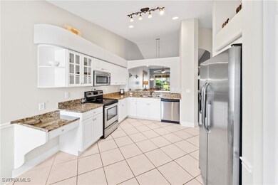 Kitchen with appliances with stainless steel finis