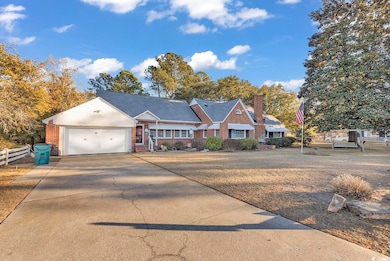 View of front facade featuring a garage