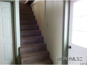 Stairs to huge bedroom