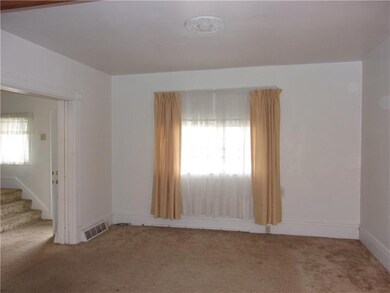 Spacious, bright living room with high ceilings an