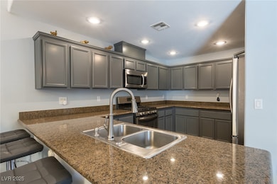 Kitchen featuring stainless steel appliances, a pe