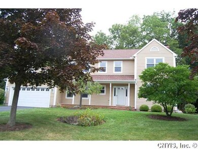 Exterior Front. Mature trees and privacy greet you