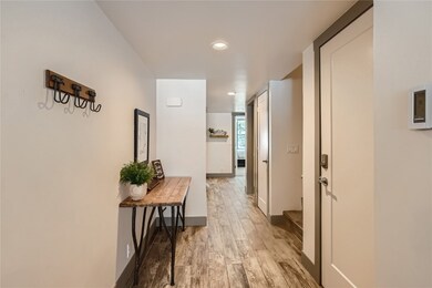 Hall featuring light hardwood / wood-style floorin