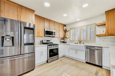 Kitchen with open shelves, new countertops, a farm