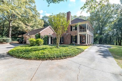 Large Parking Pad and Wrap-around driveway