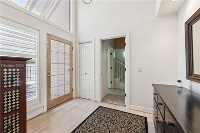 Welcoming bright front entry with lots of natural