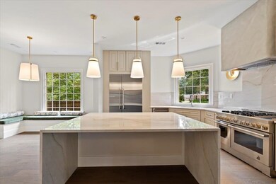 Kitchen featuring high end appliances, plenty of n