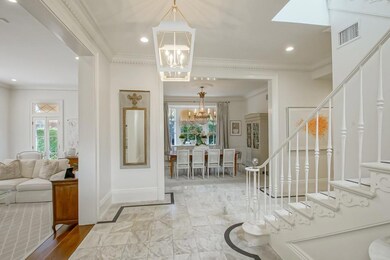 Entrance foyer w/ view of dining and living rooms