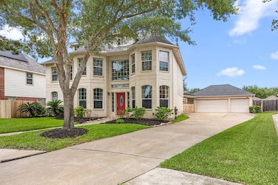 Extra long driveway leading to 3 car garage