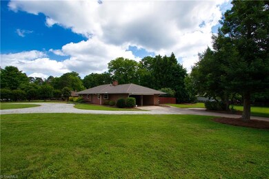Semi Circle Drive & Side Entry Carport