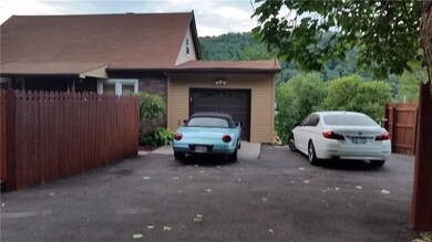 Plenty of parking for multiple cars plus a 1 car A