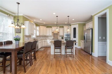 Beautiful Chef's Kitchen with center island, grani