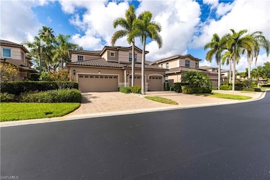 View of front of home featuring decorative driveway, a tiled roof, a garage, and stucco siding