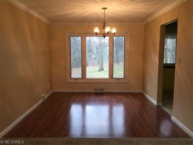 Bright Dining Room has Newer Laminate Flooring & P
