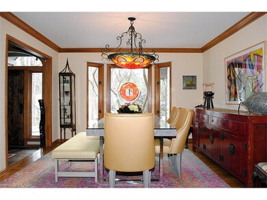 Formal Dining Room with hardwood floors.