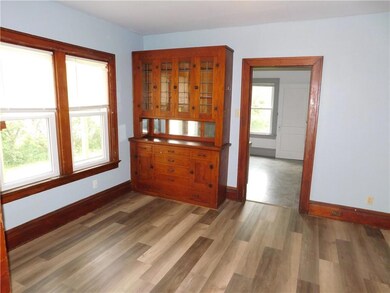Dining Room With Built In Hutch and New Flooring!