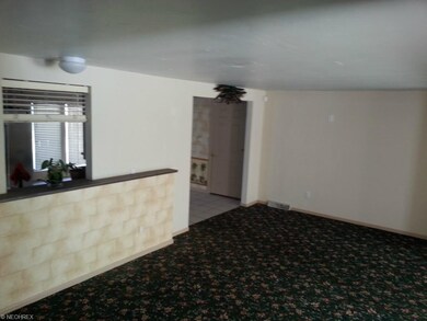 Spacious dining room area adjacent to living room 