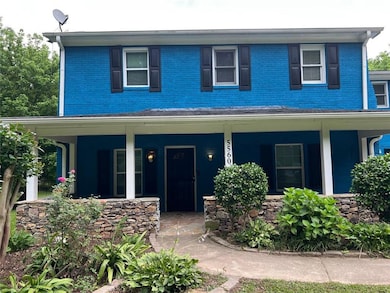 Front View. Beautifully Landscaped
