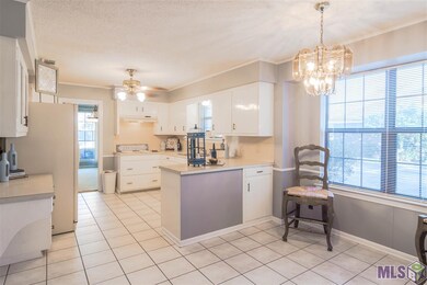 Several cabinets and a formal table can fit in the