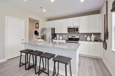 Photos shown may be an artist rendering, model home, or of the same model due to current construction stage different location. 